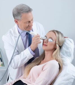 An Optometrist begins IPL treatment for a patient with dry eyes.
